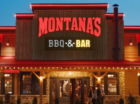 the front of a restaurant with a sign that says montanas bbq and bar.