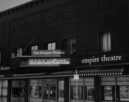 a black and white photo of the empire theatre.