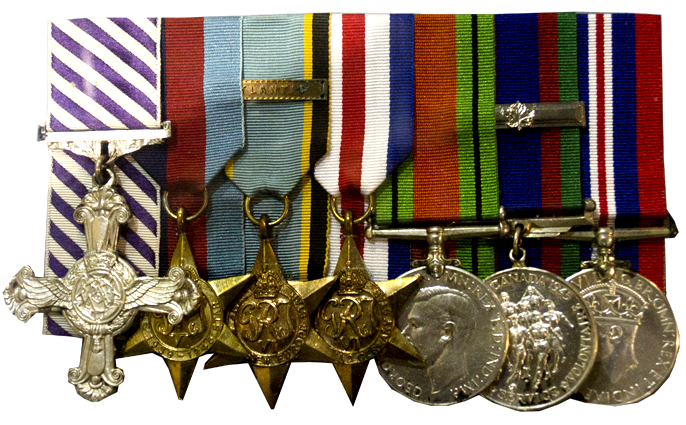 a group of medals and medals on display.