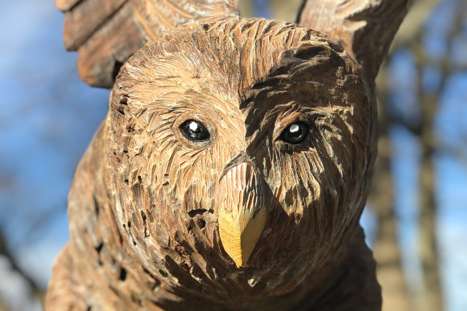 a close up of a statue of an owl.