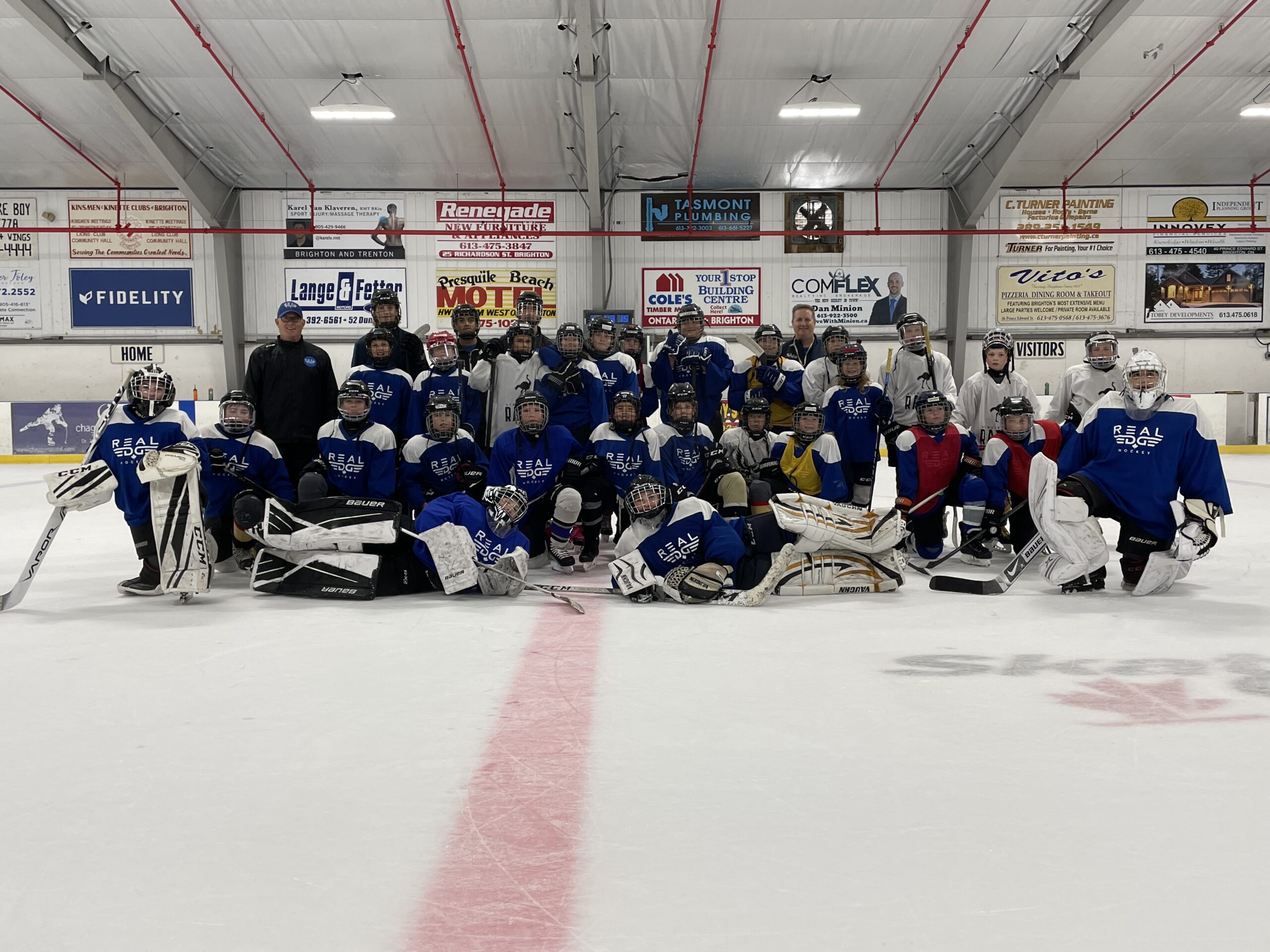 group picture of hockey players on the ice