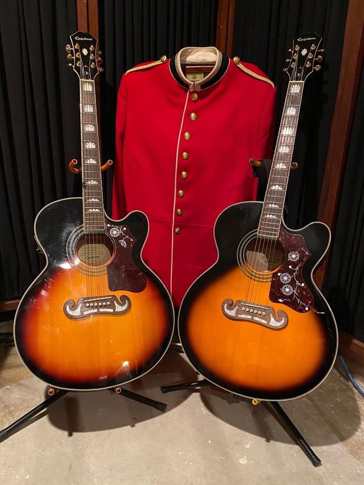 Photo of two guitars.