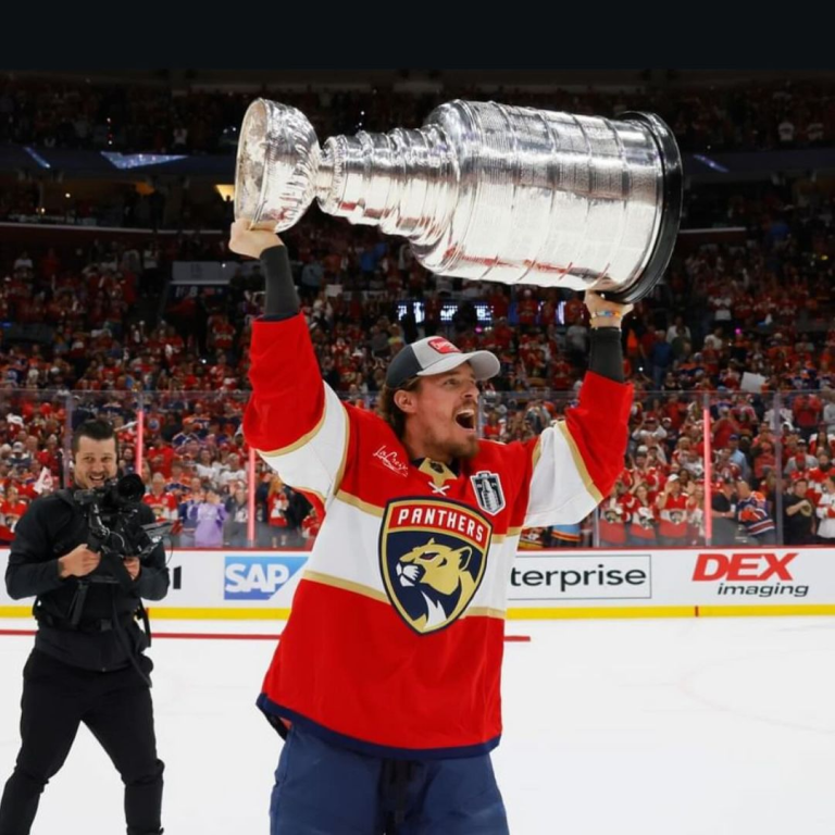 Nick Cousins hoisting the cup.