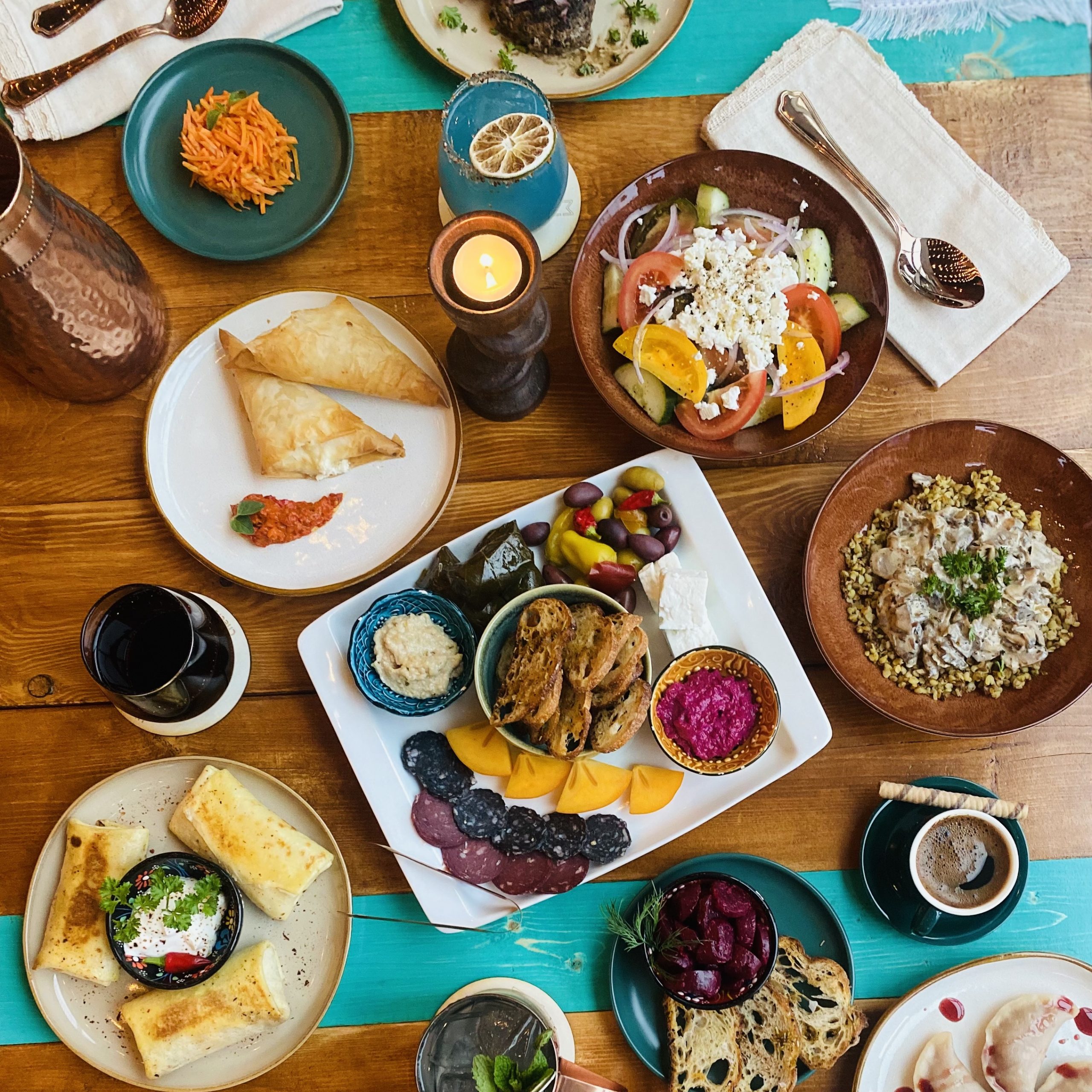 Photo showing a dinner table full of an eastern European feast