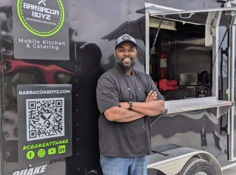 chef jamie stands in front of the barbacoa boyz trailer