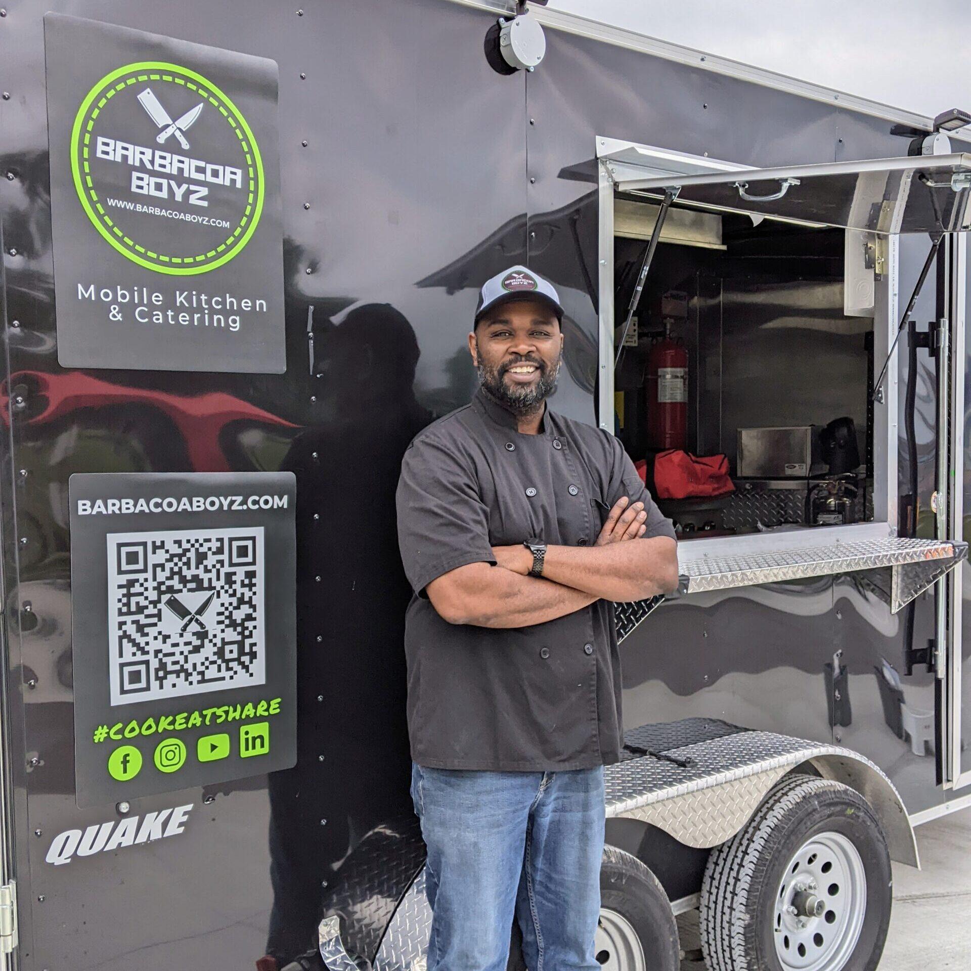 chef jamie stands in front of the barbacoa boyz trailer