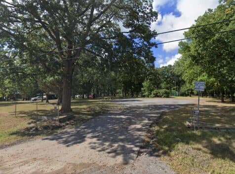 Image of a park with trees and grass