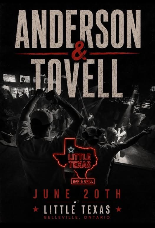 Two DJs on stage facing the crowd of dancing people with the title Anderson & Tovell