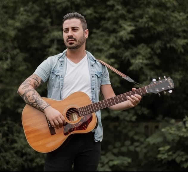 man playing guitar