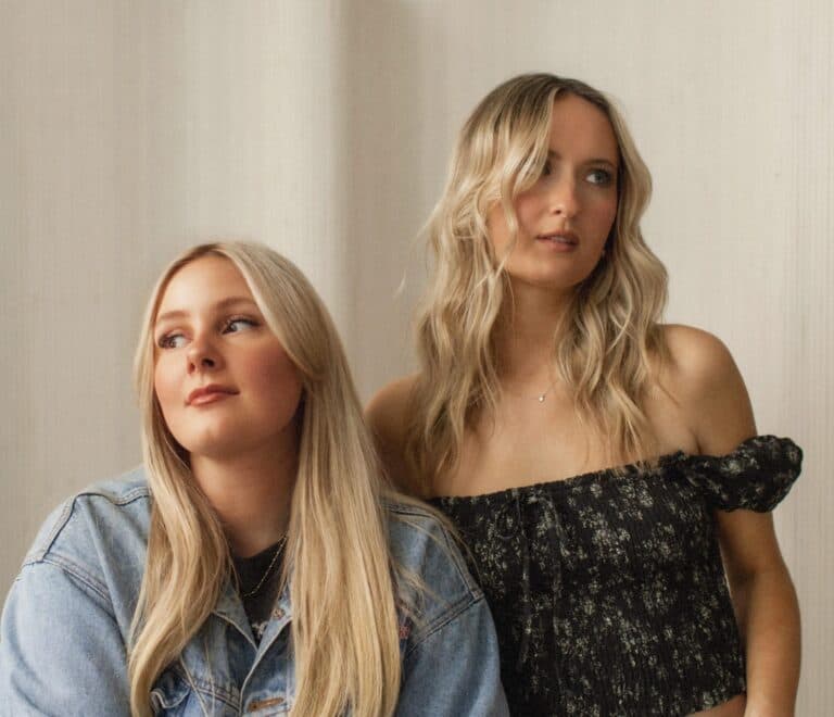 Two women looking opposite ways